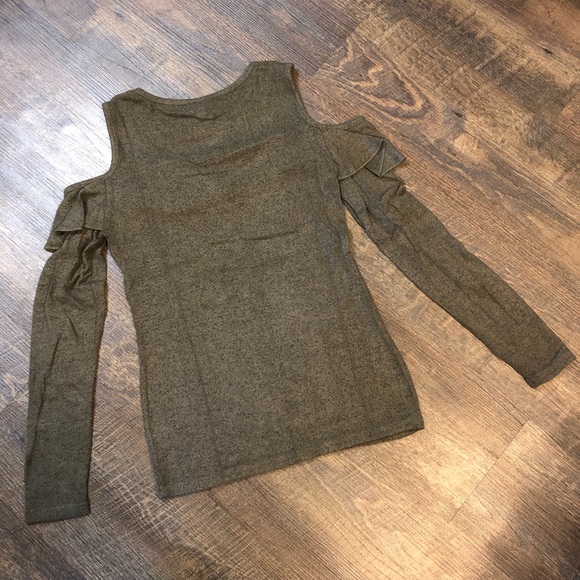 Green top with ruffle on chest size small. - Picture 2 of 3